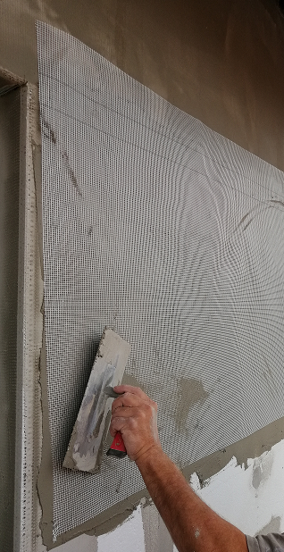 Üvegszövet háló beágyazása